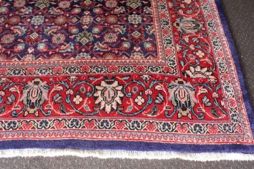 A superb large (4m x 3m) Iranian Tabriz "Afshan" Persian carpet in rich reds, blues and earthy tones