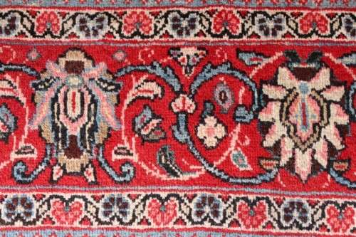 A superb large (4m x 3m) Iranian Tabriz "Afshan" Persian carpet in rich reds, blues and earthy tones