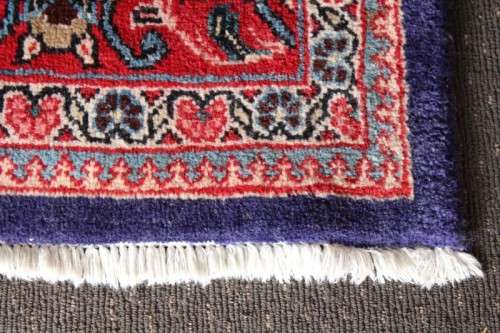 A superb large (4m x 3m) Iranian Tabriz "Afshan" Persian carpet in rich reds, blues and earthy tones