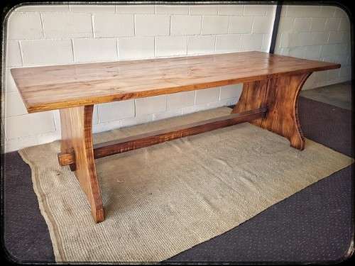 **RS17** A sturdy solid wooden (2.4m long) 8 to 10 seater dining/ patio table in great condition
