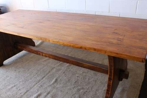 **RS17** A sturdy solid wooden (2.4m long) 8 to 10 seater dining/ patio table in great condition