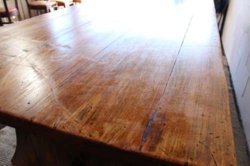 **RS17** A sturdy solid wooden (2.4m long) 8 to 10 seater dining/ patio table in great condition