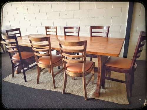 **RS17** A sturdy solid wooden (2.4m long) 8 to 10 seater dining/ patio table in great condition