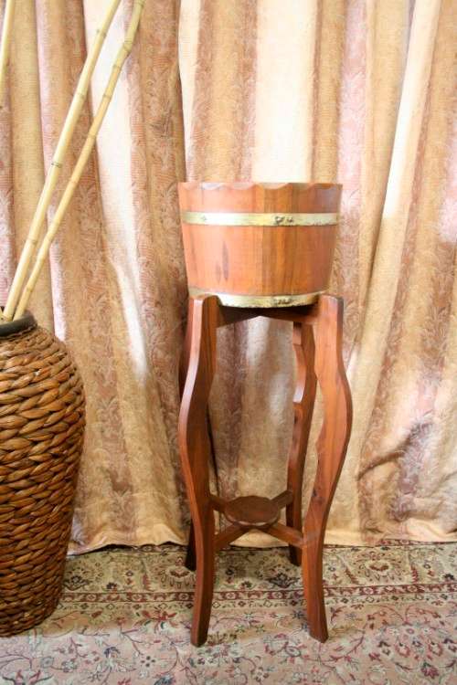 A superb vintage tall Imbuia planter stand with a brass-ring bowl in wonderful condition
