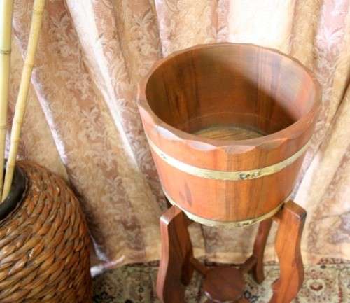 A superb vintage tall Imbuia planter stand with a brass-ring bowl in wonderful condition