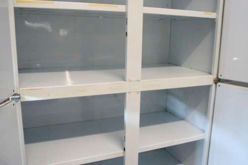 A fantastic large 6 door metal kitchen cabinet w/ loads of shelving space & a 2 door broom cupboard