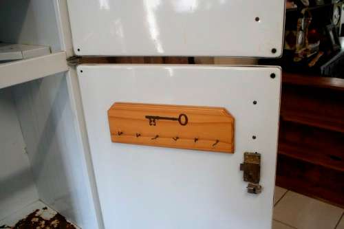 A fantastic large 6 door metal kitchen cabinet w/ loads of shelving space & a 2 door broom cupboard