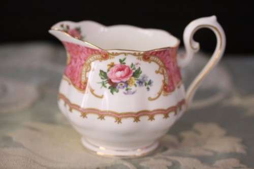 A gorgeous Royal Albert fine bone china milk jug/ creamer in the very pretty "Lady Carlyle"  pattern