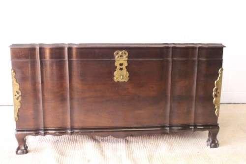 Gorgeous & solidly built solid stinkwood ball & claw kist w/ a smalls shelf & brass embellishments