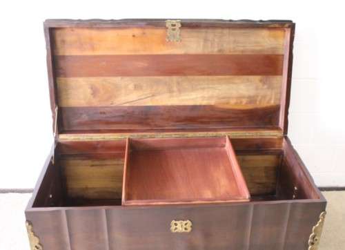 Gorgeous & solidly built solid stinkwood ball & claw kist w/ a smalls shelf & brass embellishments