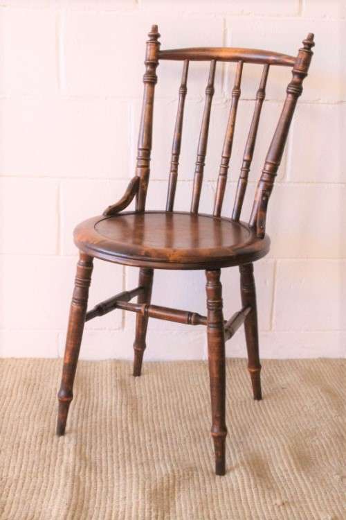 A stunning antique spindle-back occasional chair w/ a round seat and gorgeous turned legs & supports