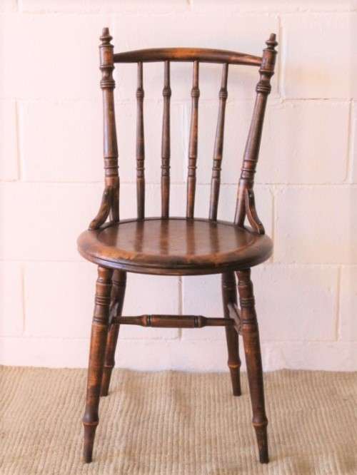 A stunning antique spindle-back occasional chair w/ a round seat and gorgeous turned legs & supports