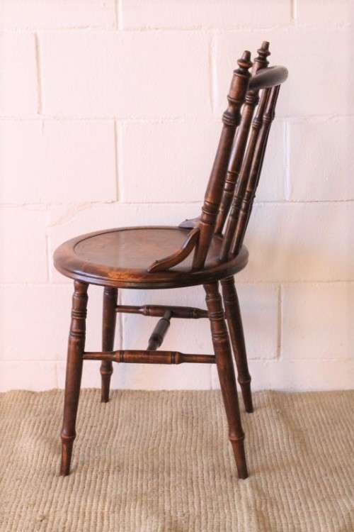 A stunning antique spindle-back occasional chair w/ a round seat and gorgeous turned legs & supports