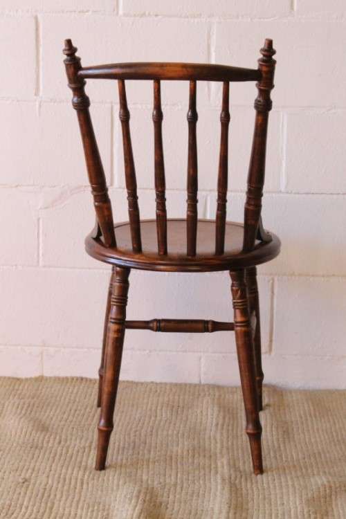 A stunning antique spindle-back occasional chair w/ a round seat and gorgeous turned legs & supports