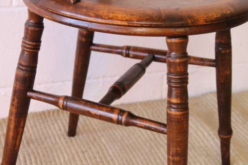 A stunning antique spindle-back occasional chair w/ a round seat and gorgeous turned legs & supports