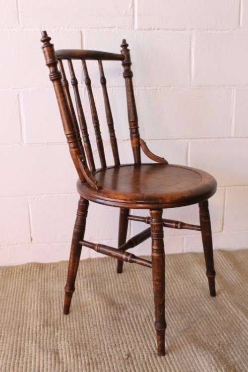 A stunning antique spindle-back occasional chair w/ a round seat and gorgeous turned legs & supports