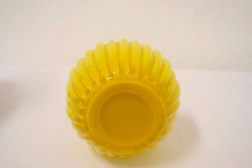 A superb vintage Retro Kanawha glass yellow with white interior handled vase.