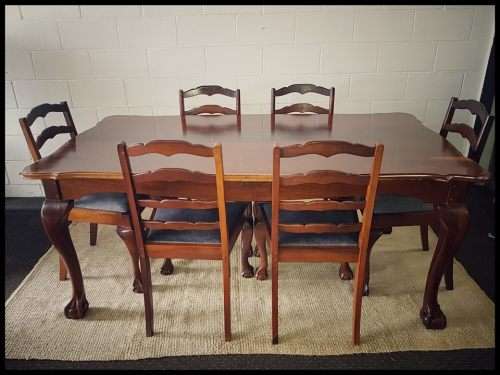 A wonderful vintage ball & claw dining room suite with 6x fabulous carved and upholstered chairs