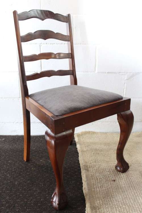 A wonderful vintage ball & claw dining room suite with 6x fabulous carved and upholstered chairs