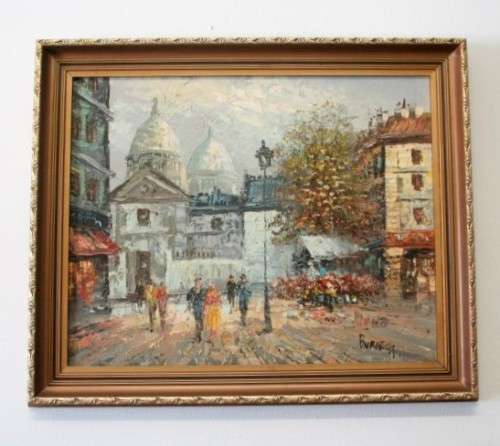 A beautiful original signed and framed "Burnett" oil painting of a village scene.