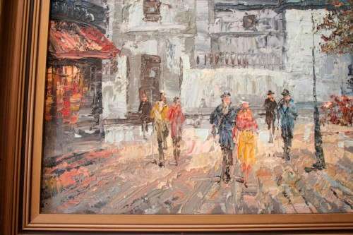 A beautiful original signed and framed "Burnett" oil painting of a village scene.