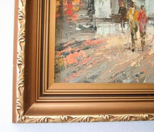 A beautiful original signed and framed "Burnett" oil painting of a village scene.