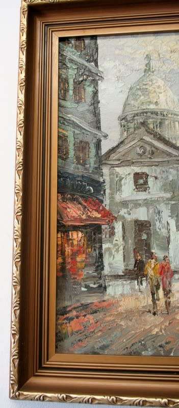 A beautiful original signed and framed "Burnett" oil painting of a village scene.