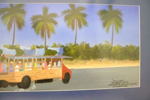 **RS17** A colourful signed and framed behind glass "Robert Nesta" painting "Dala Dala" Zanzibar.