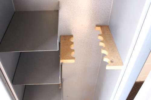 A larger, solidly made (1.46m tall) 8-rifle safe with four hand-gun and ammunition shelves