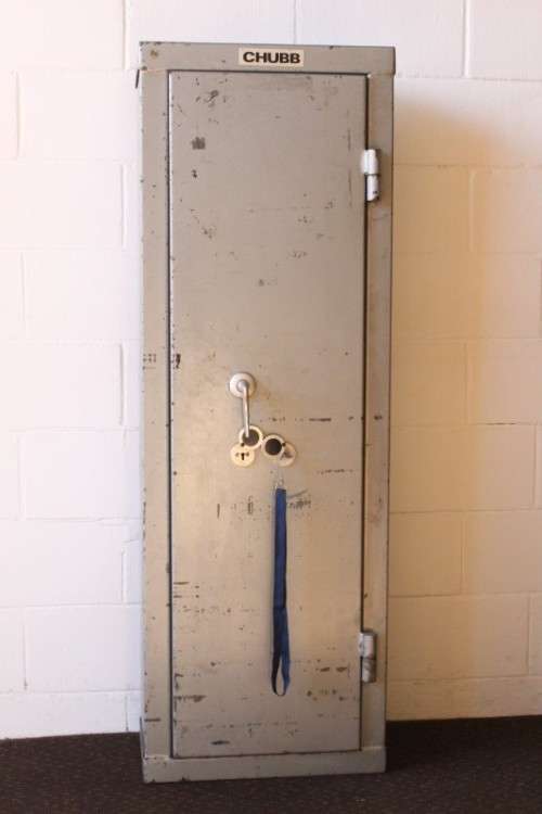 A solid Chubb Safes steel rifle safe with hand-gun/ ammunition shelves in the safe & in the door