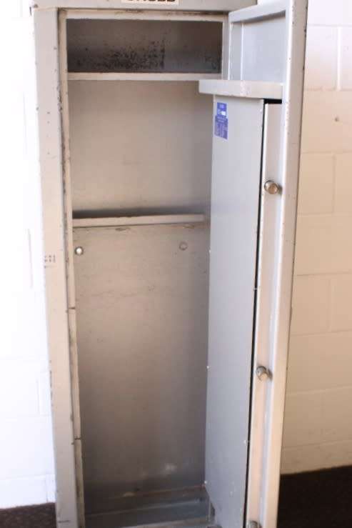 A solid Chubb Safes steel rifle safe with hand-gun/ ammunition shelves in the safe & in the door