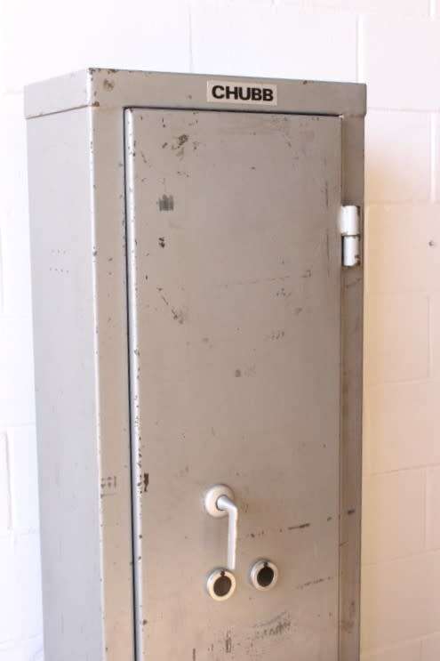 A solid Chubb Safes steel rifle safe with hand-gun/ ammunition shelves in the safe & in the door
