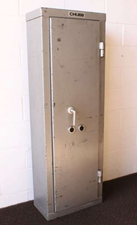 A solid Chubb Safes steel rifle safe with hand-gun/ ammunition shelves in the safe & in the door