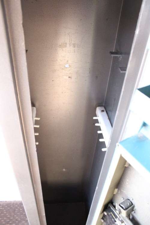 A solidly made (1.55m tall) National Safe Co 8-rifle safe with hand-gun & ammunition shelves