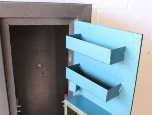 A solidly made (1.55m tall) National Safe Co 8-rifle safe with hand-gun & ammunition shelves