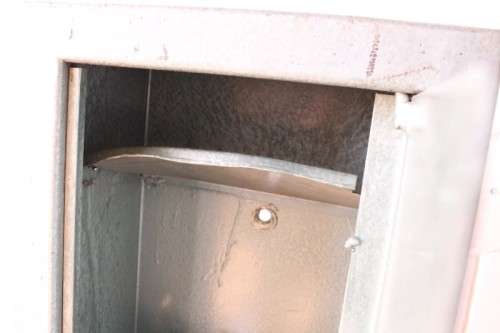 A well made 1.3m tall 4-rifle steel safe with a hand-gun/ ammunition/ key shelf