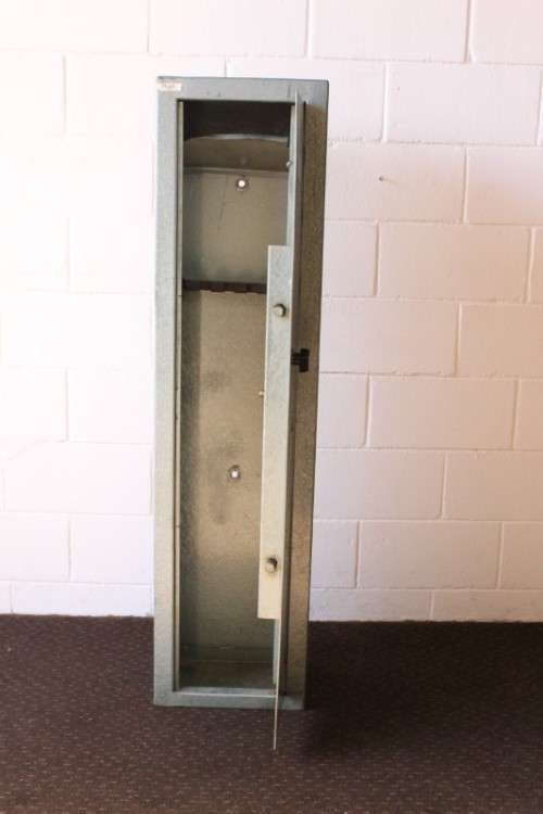 A well made 1.3m tall 4-rifle steel safe with a hand-gun/ ammunition/ key shelf