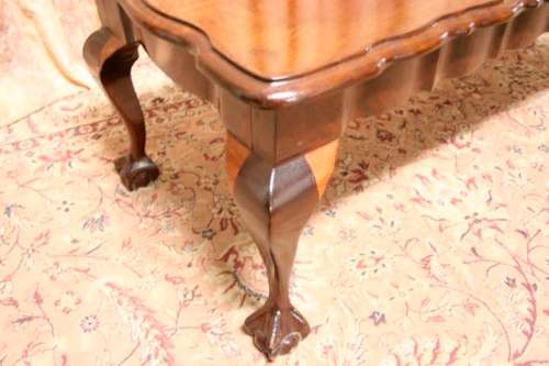 A  beautiful vintage solid Imbuia ball and claw centre coffee table.