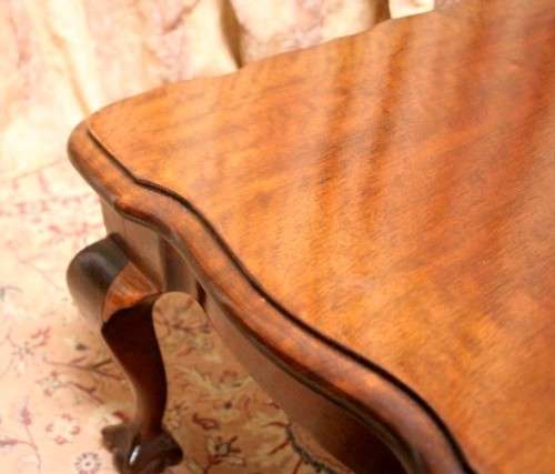 A  beautiful vintage solid Imbuia ball and claw centre coffee table.