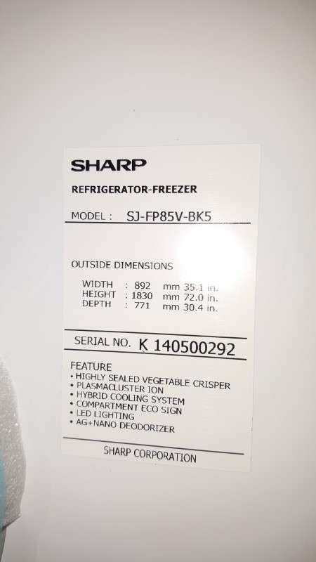 A fantastic silver front Sharp (Model SJ FP85V-BK5) 605 litre side-by-side fridge-freezer