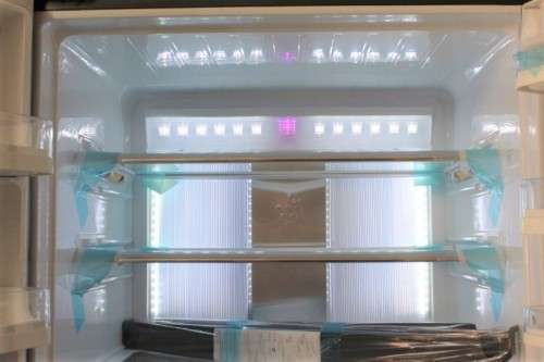 A fantastic silver front Sharp (Model SJ FP85V-BK5) 605 litre side-by-side fridge-freezer