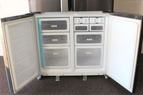 A fantastic silver front Sharp (Model SJ FP85V-BK5) 605 litre side-by-side fridge-freezer