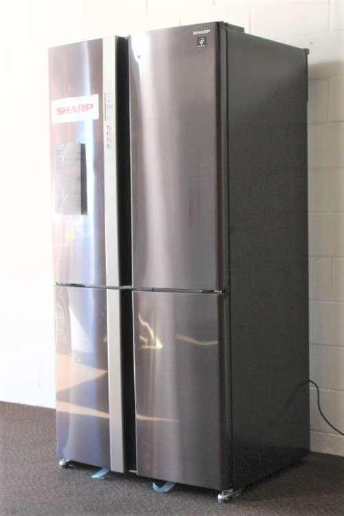 A fantastic silver front Sharp (Model SJ FP85V-BK5) 605 litre side-by-side fridge-freezer
