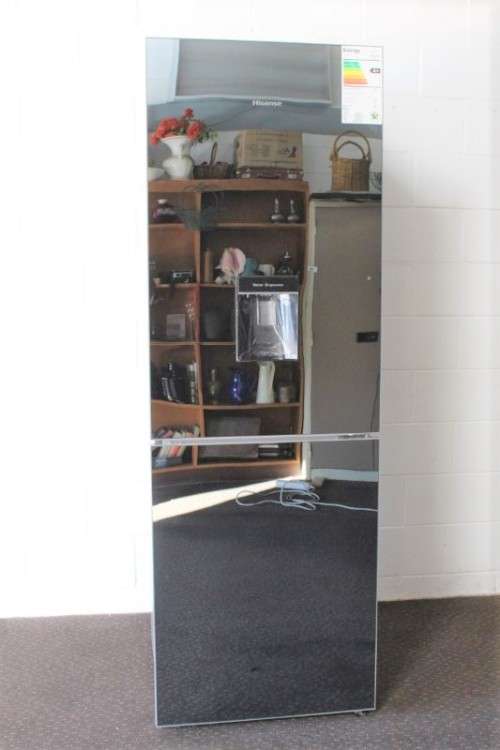 A style Hisense 323 litre mirror-front upright fridge-freezer combo with water dispenser