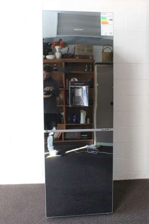 A style Hisense 323 litre mirror-front upright fridge-freezer combo with water dispenser