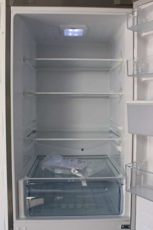 A style Hisense 323 litre mirror-front upright fridge-freezer combo with water dispenser