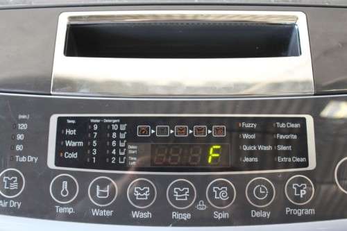 Top-quality silver LG 12kg top loader washing machine model: T12DTEFTH with Turbo Drum