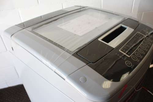 Top-quality silver LG 12kg top loader washing machine model: T12DTEFTH with Turbo Drum