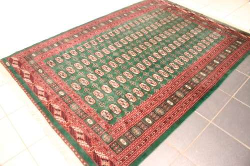 **RS17** A superb (189cm x 289cm long) rare green and red Kashmir Mori Bukhara Persian carpet