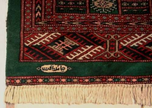 **RS17** A superb (189cm x 289cm long) rare green and red Kashmir Mori Bukhara Persian carpet